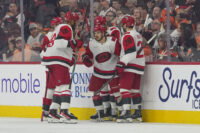 May 9, 2026; Philadelphia, Pennsylvania, USA; Carolina Hurricanes center Logan Stankoven (22) celebrates a goal with teammates against the Philadelphia Flyers in game four of the second round of the 2026 Stanely Cup Playoffs at Xfinity Mobile Arena. Mandatory Credit: James Lang-Imagn Images