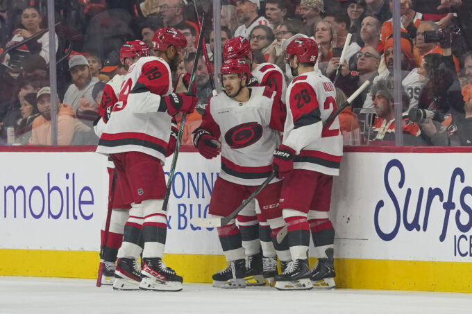 May 9, 2026; Philadelphia, Pennsylvania, USA; Carolina Hurricanes center Logan Stankoven (22) celebrates a goal with teammates against the Philadelphia Flyers in game four of the second round of the 2026 Stanely Cup Playoffs at Xfinity Mobile Arena. Mandatory Credit: James Lang-Imagn Images