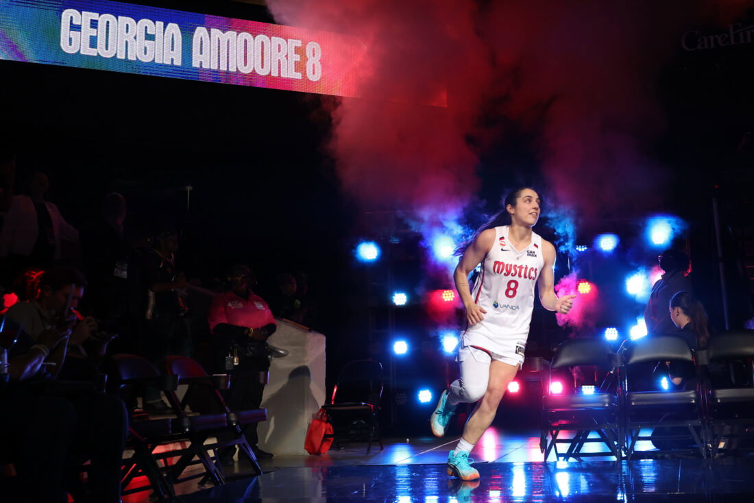 May 10, 2026; Washington, District of Columbia, USA; Washington Mystics guard Georgia Amoore (8) runs onto the court during player introductions prior to the Mystics' home opener against the New York Liberty at CareFirst Arena. Mandatory Credit: Geoff Burke-Imagn Images