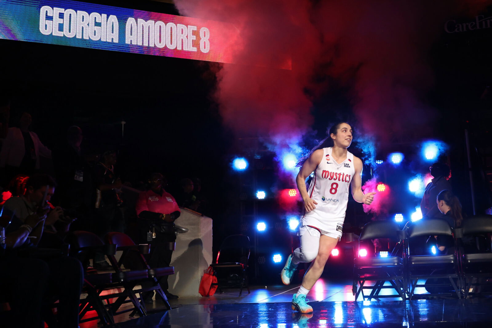 May 10, 2026; Washington, District of Columbia, USA; Washington Mystics guard Georgia Amoore (8) runs onto the court during player introductions prior to the Mystics' home opener against the New York Liberty at CareFirst Arena. Mandatory Credit: Geoff Burke-Imagn Images