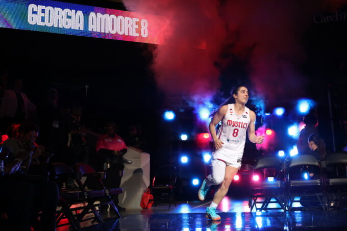 May 10, 2026; Washington, District of Columbia, USA; Washington Mystics guard Georgia Amoore (8) runs onto the court during player introductions prior to the Mystics' home opener against the New York Liberty at CareFirst Arena. Mandatory Credit: Geoff Burke-Imagn Images