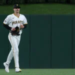 May 13, 2026; Pittsburgh, Pennsylvania, USA; Pittsburgh Pirates relief pitcher Brandan Bidois (77) jogs in from the bullpen to make his major league debut against the Colorado Rockies during the eighth inning at PNC Park. Mandatory Credit: Charles LeClaire-Imagn Images