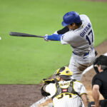 May 19, 2026; San Diego, California, USA; Los Angeles Dodgers designated hitter Shohei Ohtani (17) hits a double during the eighth inning against the San Diego Padres at Petco Park. Mandatory Credit: Denis Poroy-Imagn Images