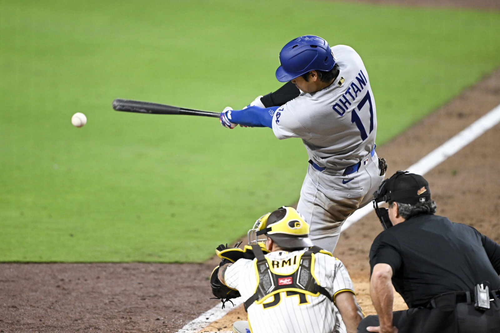 May 19, 2026; San Diego, California, USA; Los Angeles Dodgers designated hitter Shohei Ohtani (17) hits a double during the eighth inning against the San Diego Padres at Petco Park. Mandatory Credit: Denis Poroy-Imagn Images