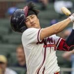 May 24, 2026; Cumberland, Georgia, USA; Atlanta Braves shortstop Ha-Seong Kim (7) loses his helmet as he strikes out against the Washington Nationals during the seventh inning at Truist Park. Mandatory Credit: Dale Zanine-Imagn Images