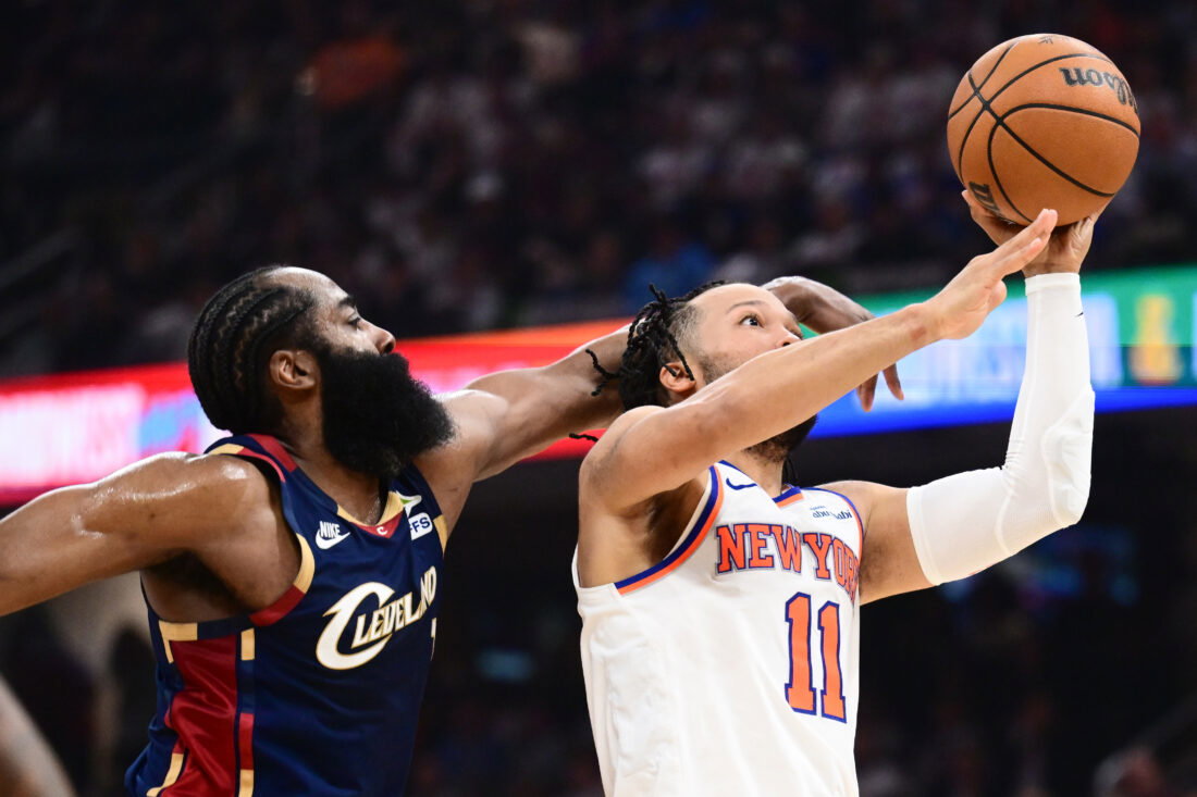 May 25, 2026; Cleveland, Ohio, USA; New York Knicks guard Jalen Brunson (11) shoots while defended by Cleveland Cavaliers guard James Harden (1) in the second quarter during game four of the eastern conference finals for the 2026 NBA playoffs at Rocket Arena. Mandatory Credit: Ken Blaze-Imagn Images