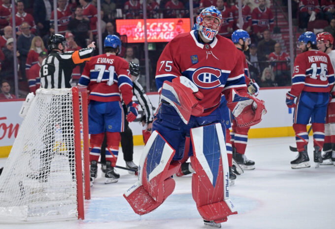 May 25, 2026; Montreal, Quebec, CAN; Montreal Canadiens goaltender Jakub Dobes (75) reacts after a collision during the second period against the Carolina Hurricanes in game three of the Eastern Conference Final of the 2026 Stanley Cup Playoffs at Bell Centre. Mandatory Credit: Eric Bolte-Imagn Images