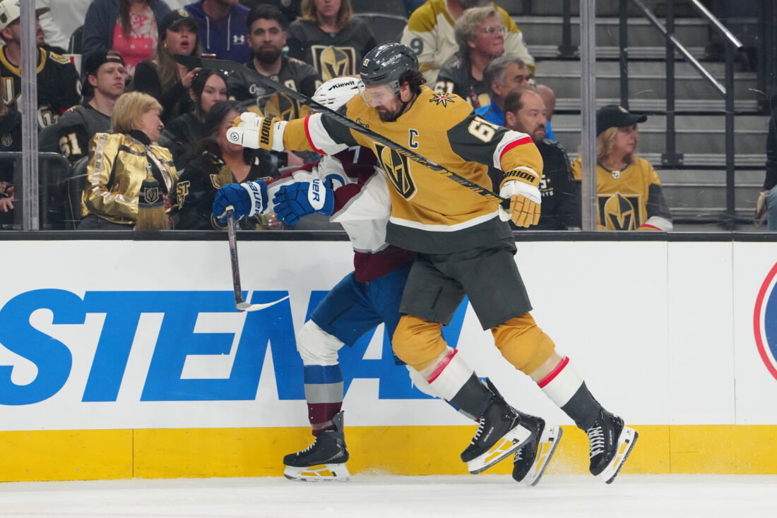 May 26, 2026; Las Vegas, Nevada, USA; Vegas Golden Knights right wing Mark Stone (61) checks Colorado Avalanche defenseman Devon Toews (7) during the first period in game four of the Western Conference Final of the 2026 Stanley Cup Playoffs at T-Mobile Arena. Mandatory Credit: Stephen R. Sylvanie-Imagn Images