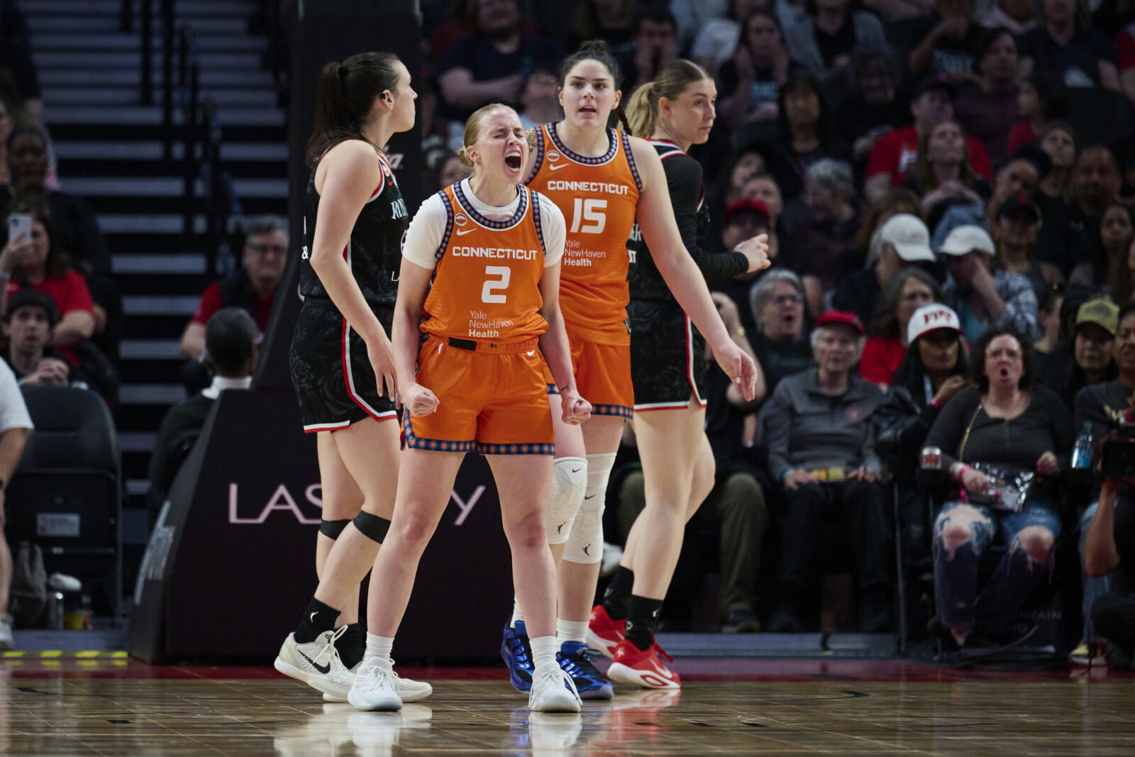 May 27, 2026; Portland, Oregon, USA; Connecticut Sun guard Hailey Van Lith (2) reacts during the second half after being fouled on a scoring play against the Portland Fire at Moda Center. Mandatory Credit: Troy Wayrynen-Imagn Images