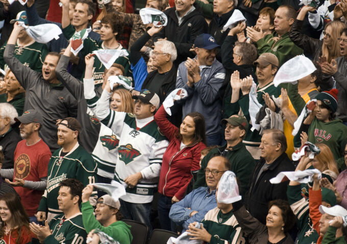 Apr 24, 2016; Saint Paul, MN, USA; Minnesota Wild fans "go crazy" to Prince's hit song "Let's Go Crazy" each time the Wild score one of four goals during the third period Minnesota Wild Dallas Starsin game six of the first round of the 2016 Stanley Cup Playoffs at Xcel Energy Center. The Stars win 5-4 over the Wild. Mandatory Credit: Marilyn Indahl-USA TODAY Sports