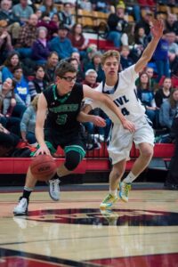 Sheldon Wohlman playing high school basketball