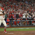 Oct 8, 2022; St. Louis, Missouri, USA; St. Louis Cardinals designated hitter Albert Pujols (5) awaits a pitch in the eighth inning against the Philadelphia Phillies during game two of the Wild Card series for the 2022 MLB Playoffs at Busch Stadium. Mandatory Credit: Jeff Curry-USA TODAY Sports