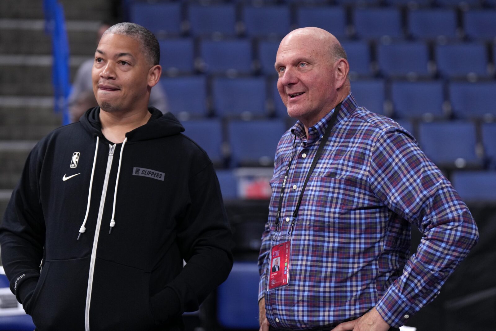 Oct 12, 2022; Ontario, California, USA; LA Clippers coach Tyronn Lue (left) talks with owner Steve Ballmer before the game against the Denver Nuggets at Toyota Arena. Mandatory Credit: Kirby Lee-USA TODAY Sports