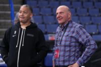 Oct 12, 2022; Ontario, California, USA; LA Clippers coach Tyronn Lue (left) talks with owner Steve Ballmer before the game against the Denver Nuggets at Toyota Arena. Mandatory Credit: Kirby Lee-USA TODAY Sports