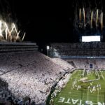 The Penn State Nittany Lions run onto the field to play Minnesota in a White Out game at Beaver Stadium on Saturday, Oct. 22, 2022, in State College. Penn State won, 45-17. Credit: Dan Rainville / USA TODAY NETWORK