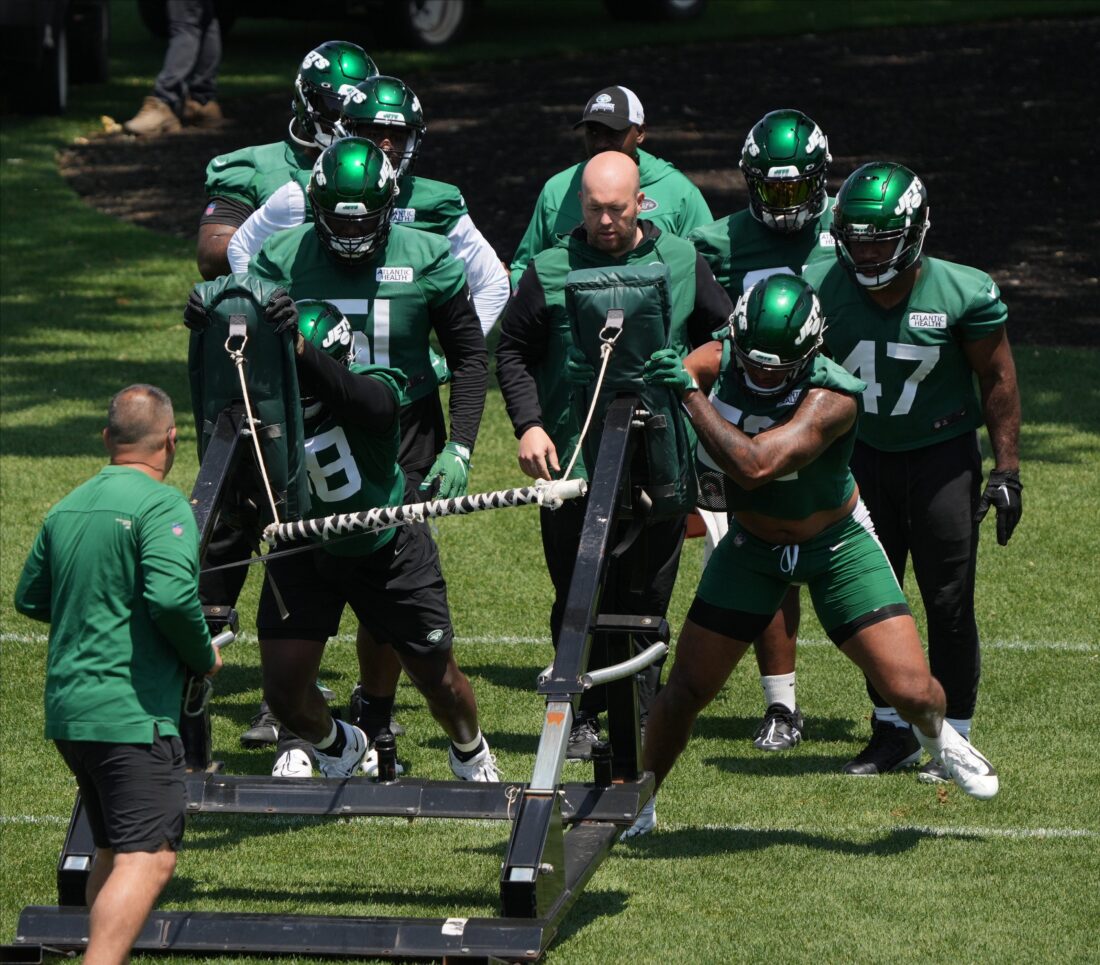 Florham Park, NJ May 31, 2023 -- The Jets defense on the tackling sled during the Jets OTA. Mandatory Credit: Chris Pedota, NorthJersey.com / USA TODAY NETWORK
