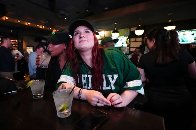 May 9, 2024; Columbus, OH, USA; Taylour Golden of Westerville, right, and Sydney Brown of Gahanna enjoy the grand opening of DraftKings Sports & Social in the Short North. Though there are no on-site betting windows, eligible customers can place bets through the DraftKings app. Credit: Adam Cairns/Columbus Dispatch / USA TODAY