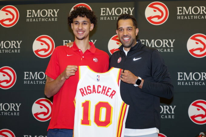 Jun 28, 2024; Atlanta, Georgia, USA; Atlanta Hawks first overall draft pick Zaccharie Risacher poses for a photo with general manager Landry Fields at the Emory Sports Medicine Complex. Mandatory Credit: Brett Davis-USA TODAY Sports