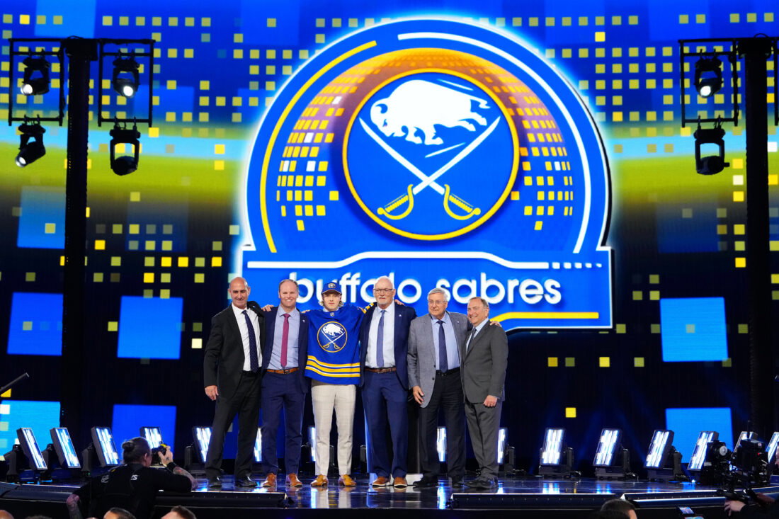 Jun 28, 2024; Las Vegas, Nevada, USA; Konsta Helenius is selected by the Buffalo Sabres with the 14th overall pick in the first round of the 2024 NHL Draft at The Sphere. Mandatory Credit: Stephen R. Sylvanie-USA TODAY Sports