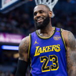 Mar 26, 2025; Indianapolis, Indiana, USA; Los Angeles Lakers forward LeBron James (23) reacts in the second half against the Indiana Pacers at Gainbridge Fieldhouse. Mandatory Credit: Trevor Ruszkowski-Imagn Images