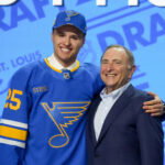 Jun 27, 2025; Los Angeles, California, USA; Justin Carbonneau is selected as the 19th overall pick to the St. Louis Blues in the first round of the 2025 NHL Draft at Peacock Theater. Mandatory Credit: Kirby Lee-Imagn Images