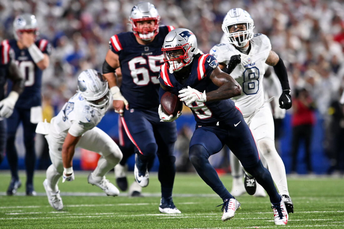 Oct 5, 2025; Orchard Park, New York, USA; New England Patriots wide receiver Stefon Diggs (8) makes a catch against the Buffalo Bills during the second half at Highmark Stadium. Mandatory Credit: Mark Konezny-Imagn Images