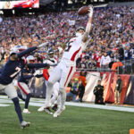 Nov 2, 2025; Foxborough, Massachusetts, USA; Atlanta Falcons wide receiver Drake London (5) makes a touchdown catch against New England Patriots cornerback Carlton Davis III (7)during the fourth quarter at Gillette Stadium. Mandatory Credit: Eric Canha-Imagn Images