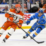 Dec 1, 2025; St. Louis, Missouri, USA; Anaheim Ducks center Mason McTavish (23) controls the puck against the St. Louis Blues during the third period at Enterprise Center. Mandatory Credit: Jeff Curry-Imagn Images