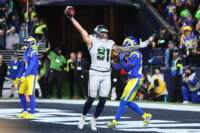 Dec 18, 2025; Seattle, Washington, USA; Seattle Seahawks tight end Eric Saubert (81) celebrates after making a catch for a game-winning two-point conversion against the Los Angeles Rams in overtime at Lumen Field. Mandatory Credit: Kevin Ng-Imagn Images