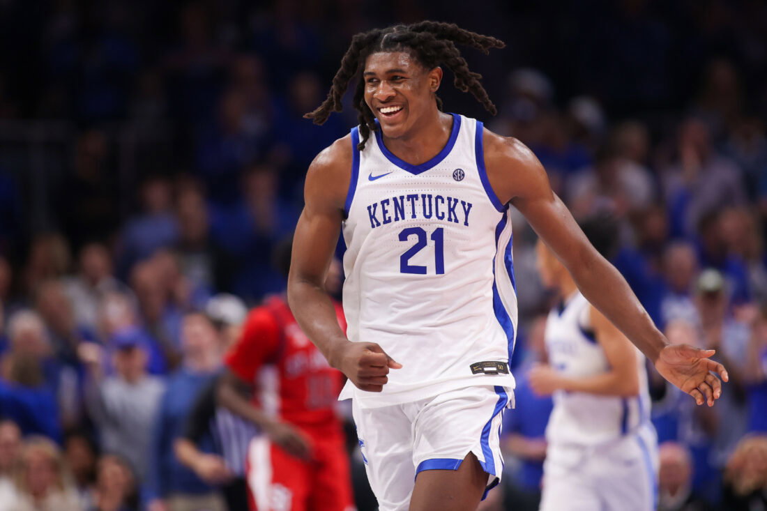 Dec 20, 2025; Atlanta, Georgia, USA; Kentucky Wildcats forward Jayden Quaintance (21) shows emotion against the St. John Red Storm in the second half at State Farm Arena. Mandatory Credit: