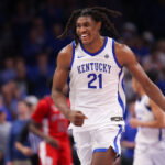 Dec 20, 2025; Atlanta, Georgia, USA; Kentucky Wildcats forward Jayden Quaintance (21) shows emotion against the St. John Red Storm in the second half at State Farm Arena. Mandatory Credit: