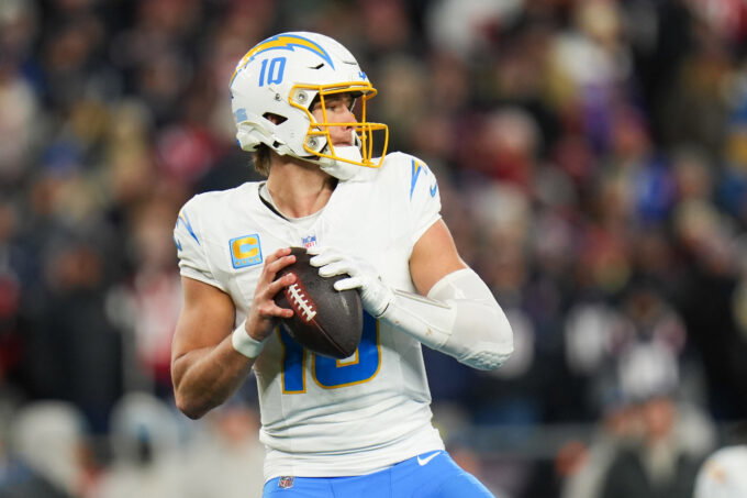 Jan 11, 2026; Foxborough, MA, USA; Los Angeles Chargers quarterback Justin Herbert (10) looks to pass during the third quarter against the New England Patriots in an AFC Wild Card Round game at Gillette Stadium. Mandatory Credit: David Butler II-Imagn Images