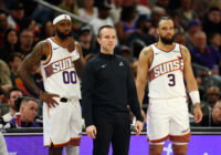 Jan 29, 2026; Phoenix, Arizona, USA; Phoenix Suns head coach Jordan Ott with forward Royce O'Neale (00) and Dillon Brooks (3) against the Detroit Pistons at Mortgage Matchup Center. Mandatory Credit: Mark J. Rebilas-Imagn Images