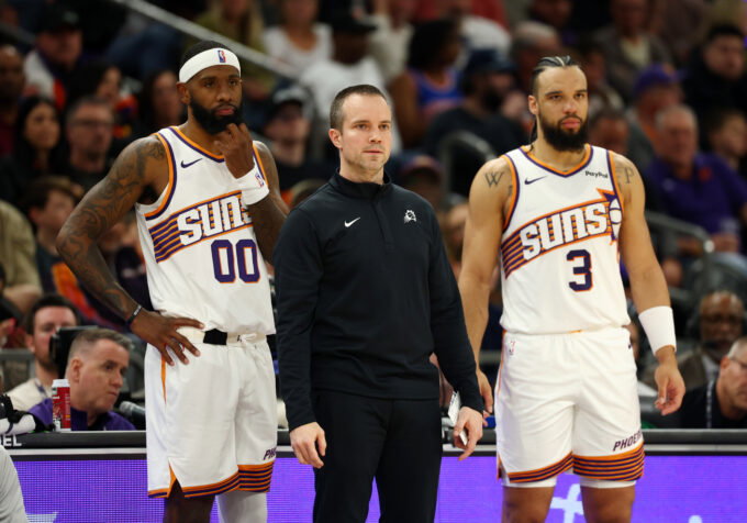 Jan 29, 2026; Phoenix, Arizona, USA; Phoenix Suns head coach Jordan Ott with forward Royce O'Neale (00) and Dillon Brooks (3) against the Detroit Pistons at Mortgage Matchup Center. Mandatory Credit: Mark J. Rebilas-Imagn Images