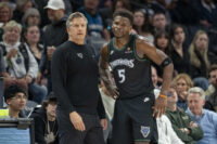 Mar 3, 2026; Minneapolis, Minnesota, USA; Minnesota Timberwolves head coach Chris Finch and guard Anthony Edwards (5) in the second half against the Memphis Grizzlies at Target Center. Mandatory Credit: Jesse Johnson-Imagn Images
