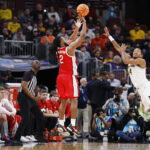 Mar 13, 2026; Chicago, IL, USA; Ohio State Buckeyes guard Bruce Thornton (2) shoots against Michigan Wolverines guard Nimari Burnett (4) during the second half at United Center. Mandatory Credit: Kamil Krzaczynski-Imagn Images