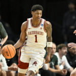 Mar 19, 2026; Portland, OR, USA; Arkansas Razorbacks guard Meleek Thomas (1) dribbles in the first half against the Hawaii Rainbow Warriors during a first round game of the men's 2026 NCAA Tournament at Moda Center. Mandatory Credit: Craig Strobeck-Imagn Images