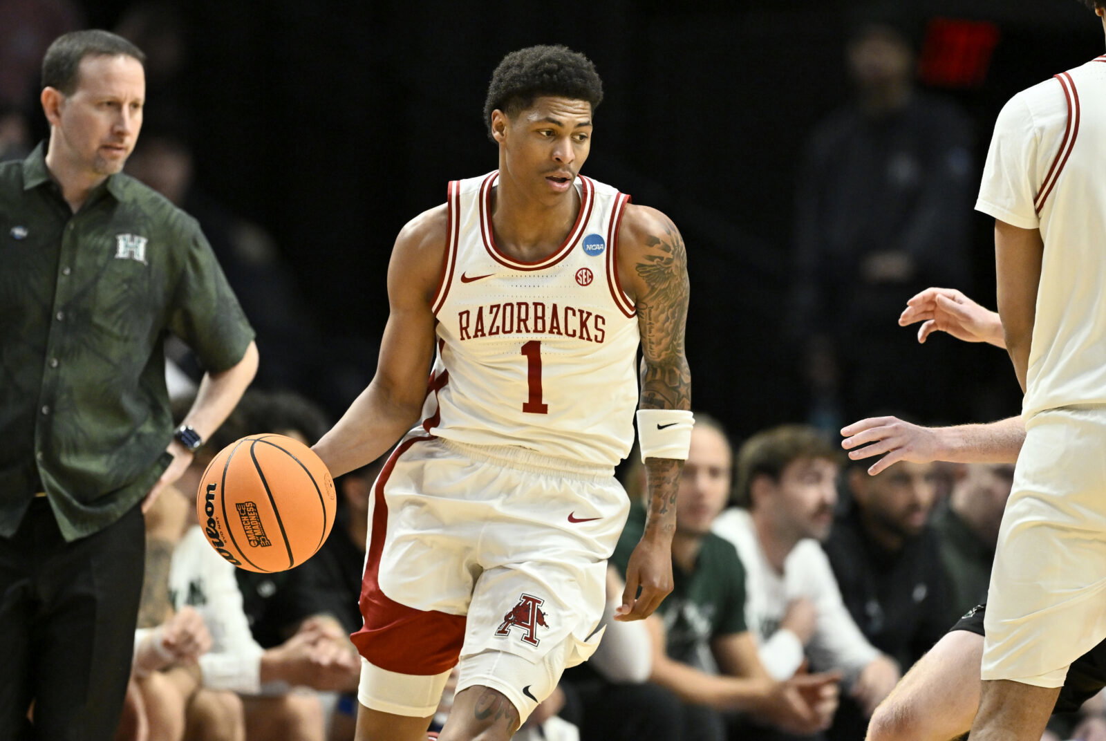 Mar 19, 2026; Portland, OR, USA; Arkansas Razorbacks guard Meleek Thomas (1) dribbles in the first half against the Hawaii Rainbow Warriors during a first round game of the men's 2026 NCAA Tournament at Moda Center. Mandatory Credit: Craig Strobeck-Imagn Images