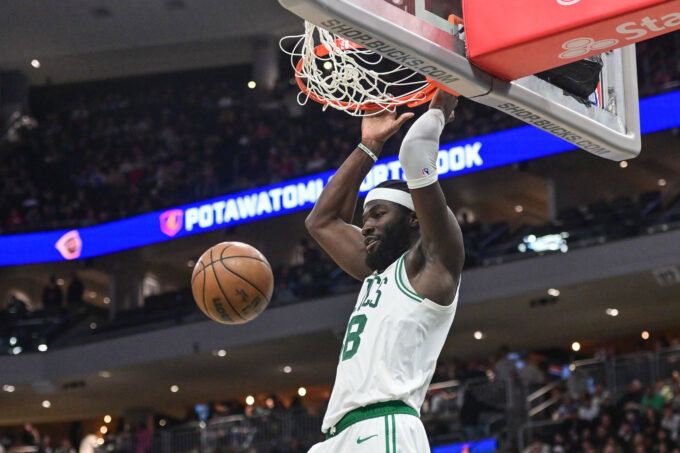 Apr 3, 2026; Milwaukee, Wisconsin, USA; Boston Celtics center Neemias Queta (88) dunks the ball against the Milwaukee Bucks in the third quarter at Fiserv Forum. Mandatory Credit: Benny Sieu-Imagn Images