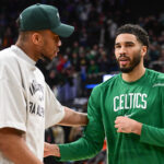 Apr 3, 2026; Milwaukee, Wisconsin, USA; Milwaukee Bucks forward Giannis Antetokounmpo (34) greets Boston Celtics forward Jayson Tatum (0) after the game at Fiserv Forum. Mandatory Credit: