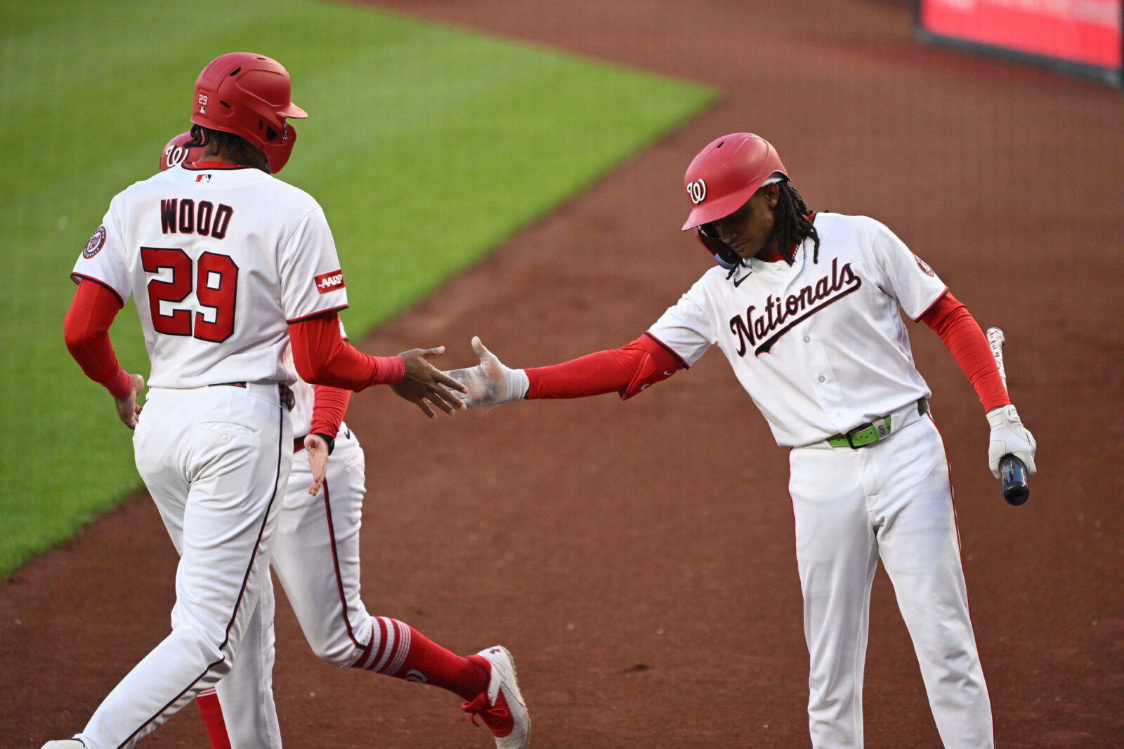 Apr 7, 2026; Washington, District of Columbia, USA; Washington Nationals left fielder James Wood (29) celebrates scoring a run with shortstop CJ Abrams (5) against the St. Louis Cardinals during the first inning at Nationals Park. Mandatory Credit: Rafael Suanes-Imagn Images