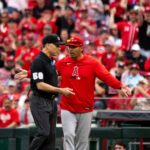 Los Angeles Angels manager Kurt Suzuki argues with an umpire in the eight inning between the Cincinnati Reds and the Los Angeles Angels at Great American Ball in Cincinnati on Saturday, April 11, 2026.