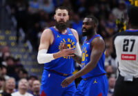 Apr 20, 2026; Denver, Colorado, USA; Denver Nuggets guard Tim Hardaway Jr. (10) and center Jonas Valanciunas (17) react in the first half against the Minnesota Timberwolves during game two of the first round of the 2026 NBA Playoffs at Ball Arena. Mandatory Credit: Ron Chenoy-Imagn Images