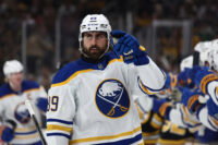 May 1, 2026; Boston, Massachusetts, USA; Buffalo Sabres right wing Alex Tuch (89) points to his goaltender after being congratulated at the bench after scoring against the Boston Bruins during the first period of game six of the first round of the 2026 Stanley Cup Playoffs at TD Garden. Mandatory Credit: Winslow Townson-Imagn Images