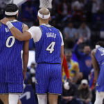 May 3, 2026; Detroit, Michigan, USA; Orlando Magic guard Jalen Suggs (4) puts his arm around guard Anthony Black (0) in the second half against the Detroit Pistons during game seven of the first round of the 2026 NBA Playoffs at Little Caesars Arena. Mandatory Credit: Rick Osentoski-Imagn Images