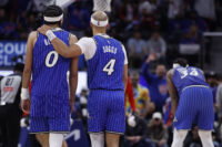 May 3, 2026; Detroit, Michigan, USA; Orlando Magic guard Jalen Suggs (4) puts his arm around guard Anthony Black (0) in the second half against the Detroit Pistons during game seven of the first round of the 2026 NBA Playoffs at Little Caesars Arena. Mandatory Credit: Rick Osentoski-Imagn Images