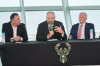May 6, 2026; Milwaukee, WI, USA; Milwaukee Bucks general manager Jon Horst (left) and co-owner Jimmy Haslam (right) introduce new head coach Taylor Jenkins (center) at a press conference at Milwaukee Art Museum. Mandatory Credit: Benny Sieu-Imagn Images