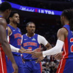 May 17, 2026; Detroit, Michigan, USA; Detroit Pistons center Jalen Duren (0), forward Tobias Harris (12), guard Ausar Thompson (9), guard Cade Cunningham (2) and guard Daniss Jenkins (24) huddle up in the first half against the Cleveland Cavaliers during game seven of the second round of the 2026 NBA Playoffs at Little Caesars Arena. Mandatory Credit: Rick Osentoski-Imagn Images