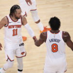 May 19, 2026; New York, New York, USA; New York Knicks guard Jalen Brunson (11) celebrates with forward Og Anunoby (8) after defeating the Cleveland Cavaliers in overtime of game one of the eastern conference finals for the 2026 NBA playoffs at Madison Square Garden. Mandatory Credit: Vincent Carchietta-Imagn Images