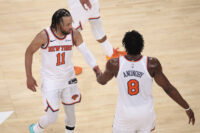 May 19, 2026; New York, New York, USA; New York Knicks guard Jalen Brunson (11) celebrates with forward Og Anunoby (8) after defeating the Cleveland Cavaliers in overtime of game one of the eastern conference finals for the 2026 NBA playoffs at Madison Square Garden. Mandatory Credit: Vincent Carchietta-Imagn Images